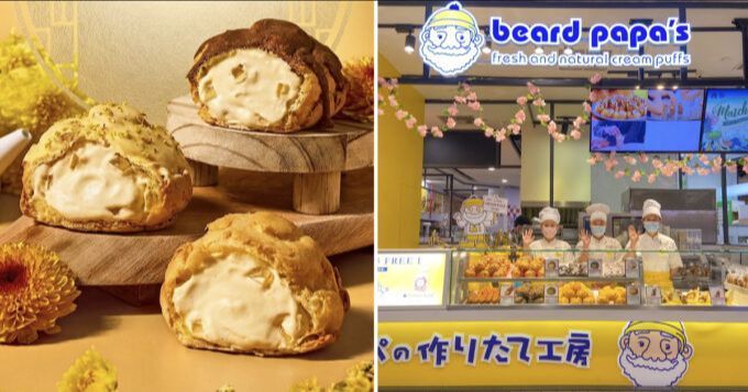 Chrysanthemum cream puffs, one split open to show the filling, beside a Beard Papa's store counter